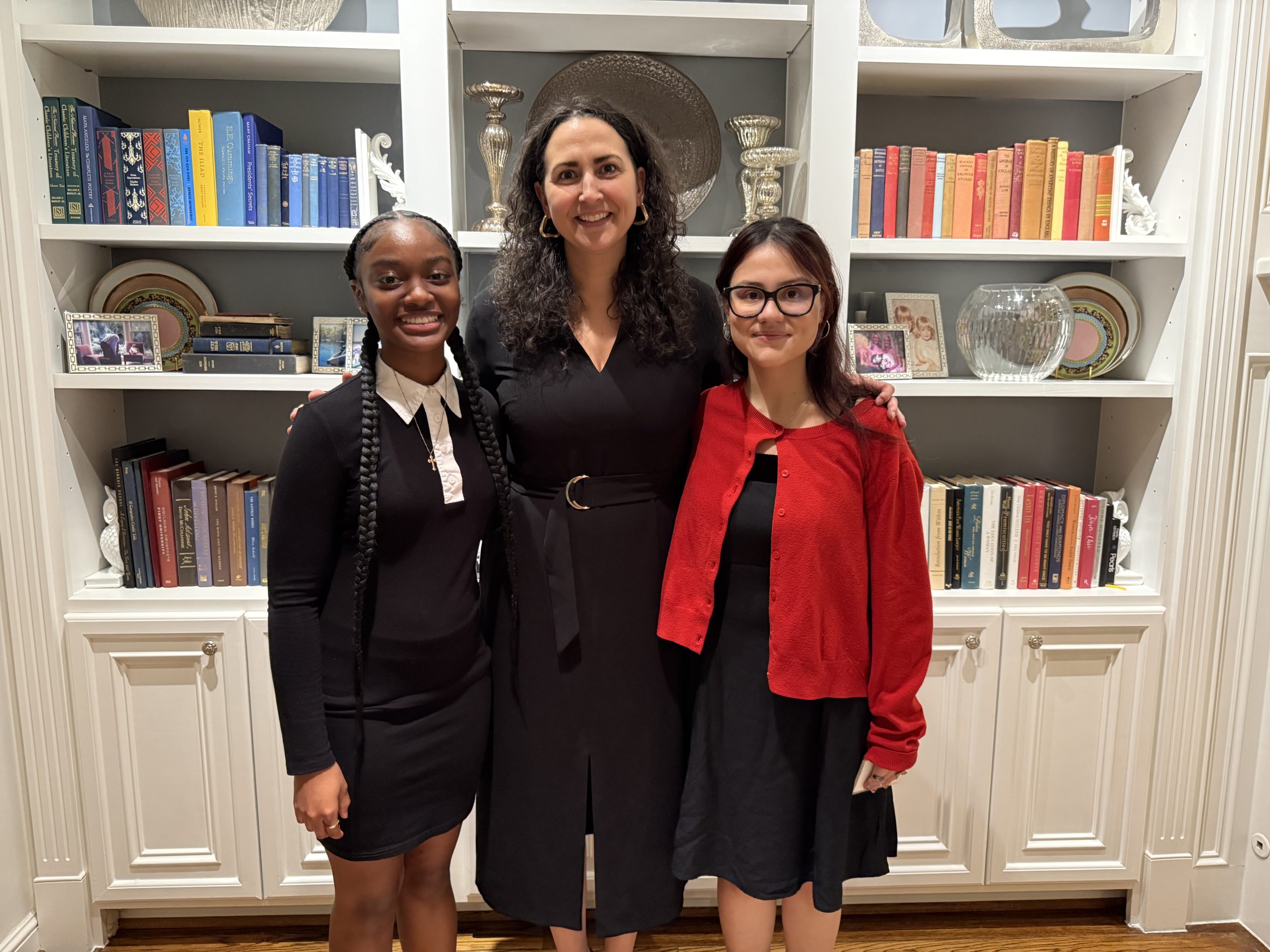Ashley Cash with two EMERGE students
